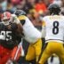 Cleveland Browns defensive end Myles Garrett (95) tries to get past Pittsburgh Steelers guard Spencer Anderson (74) as quarterback Aaron Rodgers (8) looks to throw during the second half of an NFL football game at Huntington Bank Field, Dec. 28, 2025, in Cleveland, Ohio.