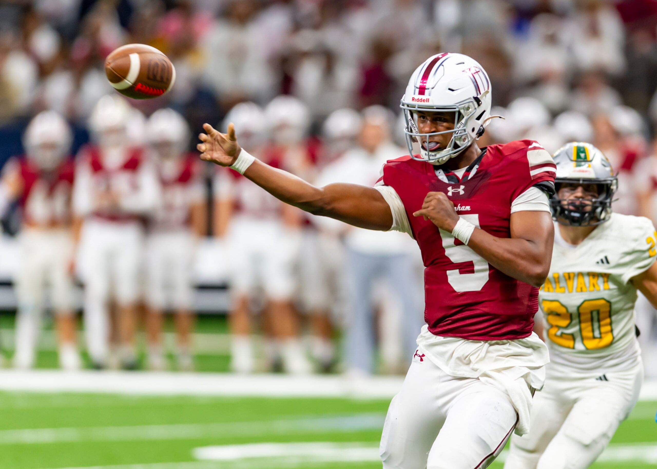 Calvary Baptist takes on Dunham Football and quarterback Elijah Haven (5) in the Division III Select State Championship Game. Thursday, Dec. 11, 2025.