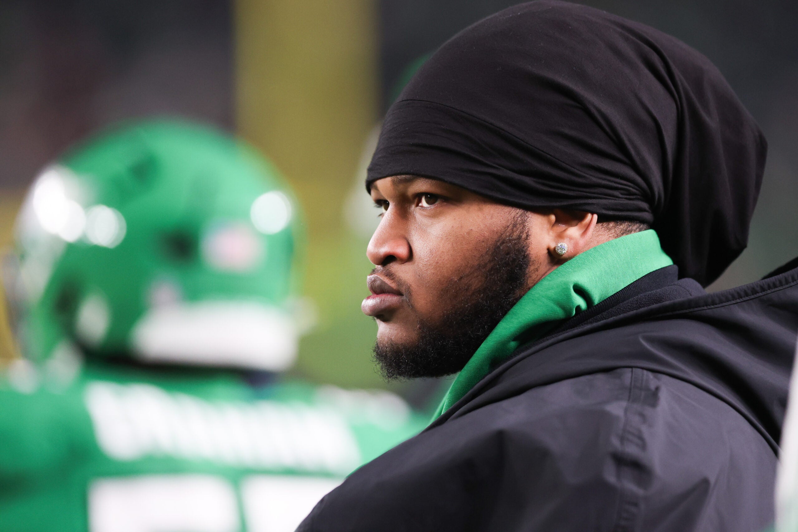 Jan 4, 2026; Philadelphia, Pennsylvania, USA; Philadelphia Eagles defensive tackle Jalen Carter looks on from the sideline during the third quarter against the Washington Commanders at Lincoln Financial Field.
