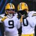 Jan 10, 2026; Chicago, IL, USA; Green Bay Packers wide receiver Matthew Golden (0) reacts with wide receiver Christian Watson (9) after scoring a touchdown against the Chicago Bears during the second half of an NFC Wild Card Round game at Soldier Field.