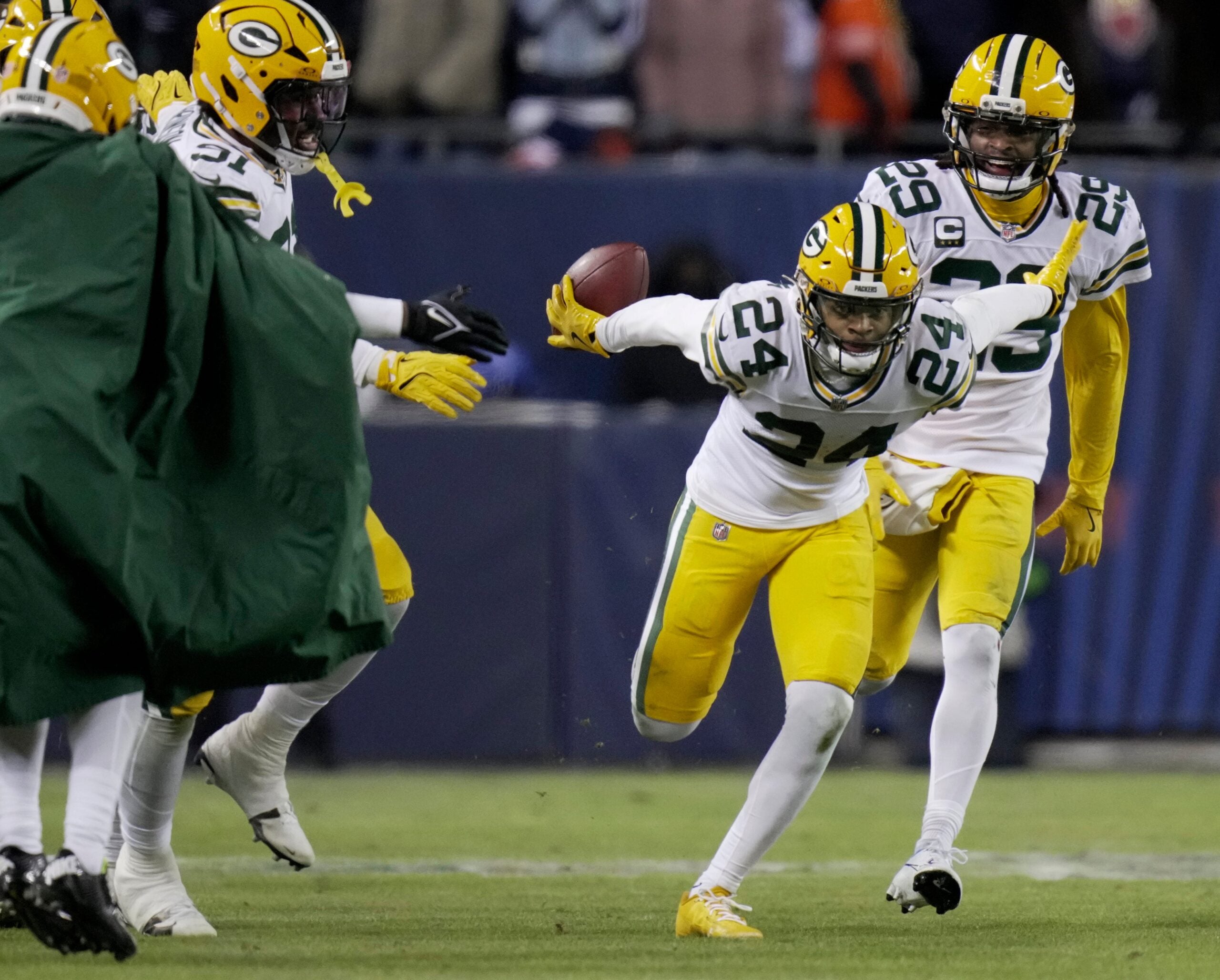 Green Bay Packers cornerback Carrington Valentine (24) celebrates his interception during the second quarter of their wild card playoff game against the Chicago Bears Saturday, January 10, 2026 at Soldier Field in Chicago, Illinois.