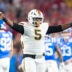Jan 8, 2026; Glendale, AZ, USA; Miami Hurricanes defensive lineman Justin Scott (5) against the Mississippi Rebels during the 2026 Fiesta Bowl and semifinal game of the College Football Playoff at State Farm Stadium.