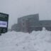 Snow falls around Lambeau Field on Sunday, March 15, 2026, in Green Bay, Wis. The storm is forecasted to drop approximately 16 inches of snow by the time it clears in the afternoon of March 16.