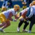 Green Bay Packers offensive lineman Jager Burton (52) runs through a drill during practice on Tuesday, June 2, 2026, at Ray Nitschke Field in Ashwaubenon, Wis.
