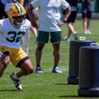 Green Bay Packers running back MarShawn Lloyd (32) runs through a drill during practice on Tuesday, June 2, 2026, at Ray Nitschke Field in Ashwaubenon, Wis.