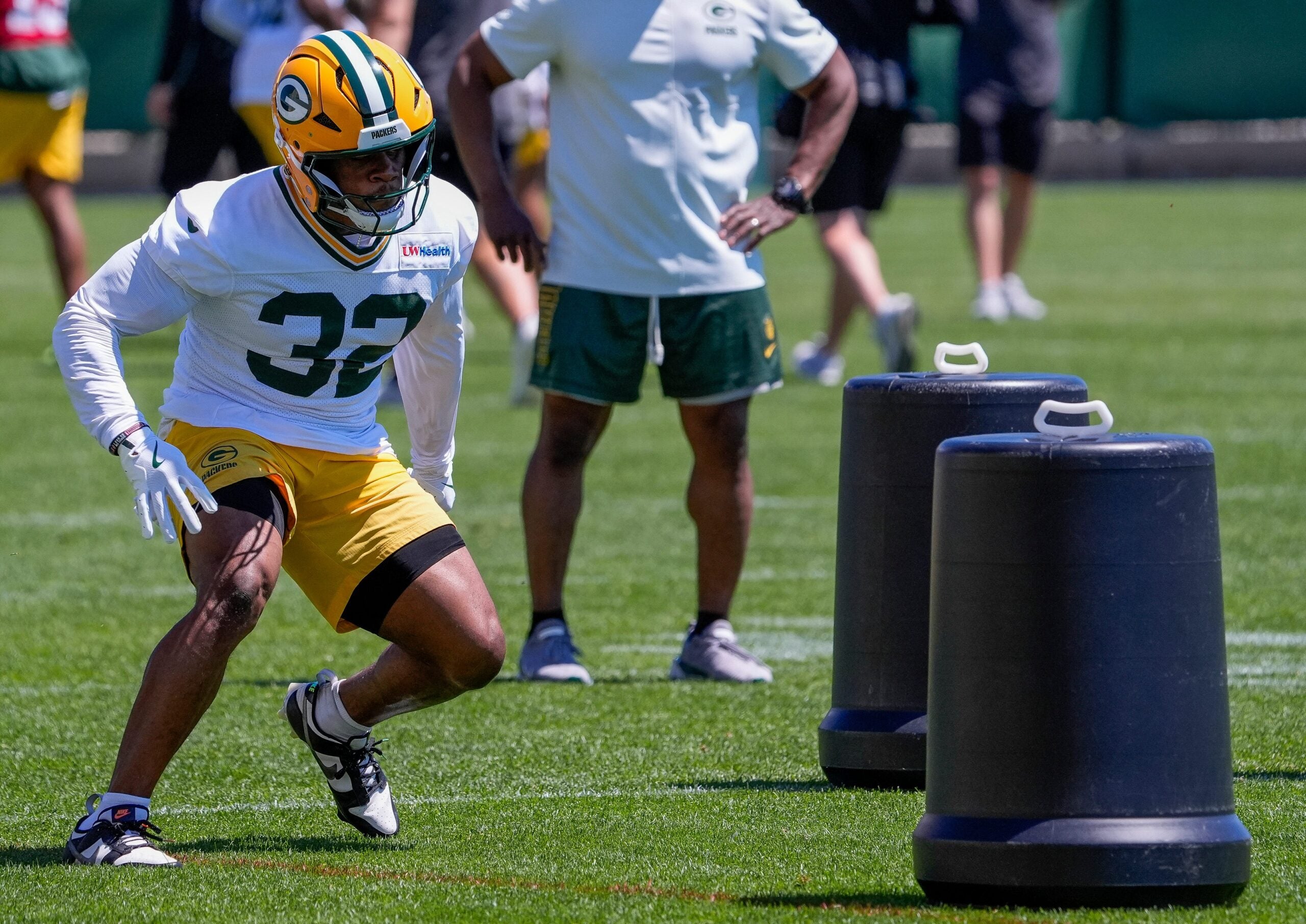 Green Bay Packers running back MarShawn Lloyd (32) runs through a drill during practice on Tuesday, June 2, 2026, at Ray Nitschke Field in Ashwaubenon, Wis.