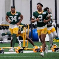 Green Bay Packers cornerback Brandon Cisse (2) jogs to the next warm-up station during practice on Tuesday, June 2, 2026, at the Don Hutson Center in Ashwaubenon, Wis.