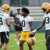 Green Bay Packers wide receiver Christian Watson (9), Green Bay Packers wide receiver Matthew Golden (0), and Green Bay Packers wide receiver Savion Williams (83) prepare to run drills during the first day of a three-day minicamp at the Don Hutson Center in Ashwaubenon, Wisconsin on Tuesday, June 9, 2026.