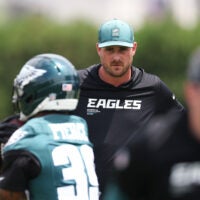 Jun 10, 2026; Philadelphia, PA, USA; Philadelphia Eagles offensive coordinator Sean Mannion watches as players run drills during minicamp at Jefferson Health Training Complex.