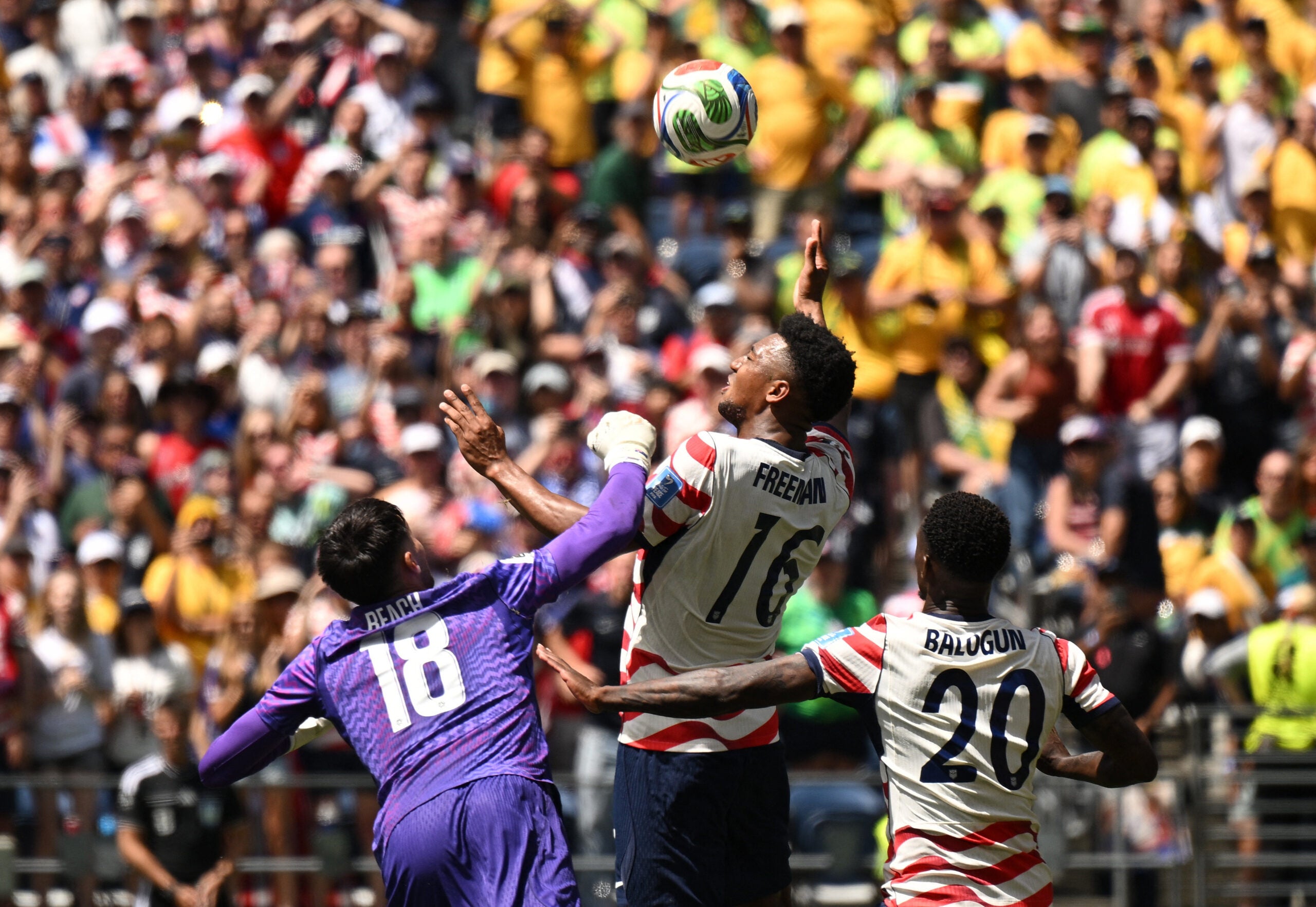 June 19, 2026; Seattle, Washington, U.S.; Alex Freeman of the U.S. scores their second goal past Australia's Patrick Beach.
