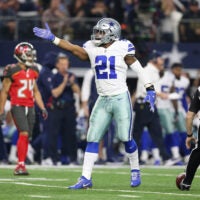 Dec 18, 2016; Arlington, TX, USA; Dallas Cowboys running back Ezekiel Elliott (21) signals first down in the first quarter against the Tampa Bay Buccaneers at AT&T Stadium.