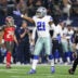 Dec 18, 2016; Arlington, TX, USA; Dallas Cowboys running back Ezekiel Elliott (21) signals first down in the first quarter against the Tampa Bay Buccaneers at AT&T Stadium.