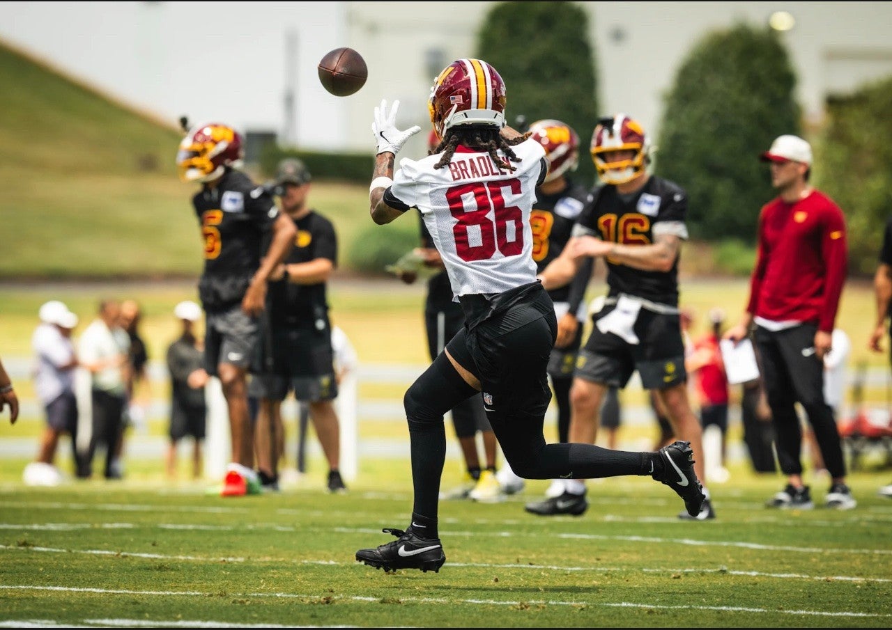 Jaden Bradley catches a pass during Day 2 of Commanders mandatory minicamp.