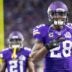 Sep 18, 2016; Minneapolis, MN, USA; Minnesota Vikings running back Adrian Peterson (28) poses for a photo against the Green Bay Packers at U.S. Bank Stadium. The Vikings defeated the Packers 17-14.
