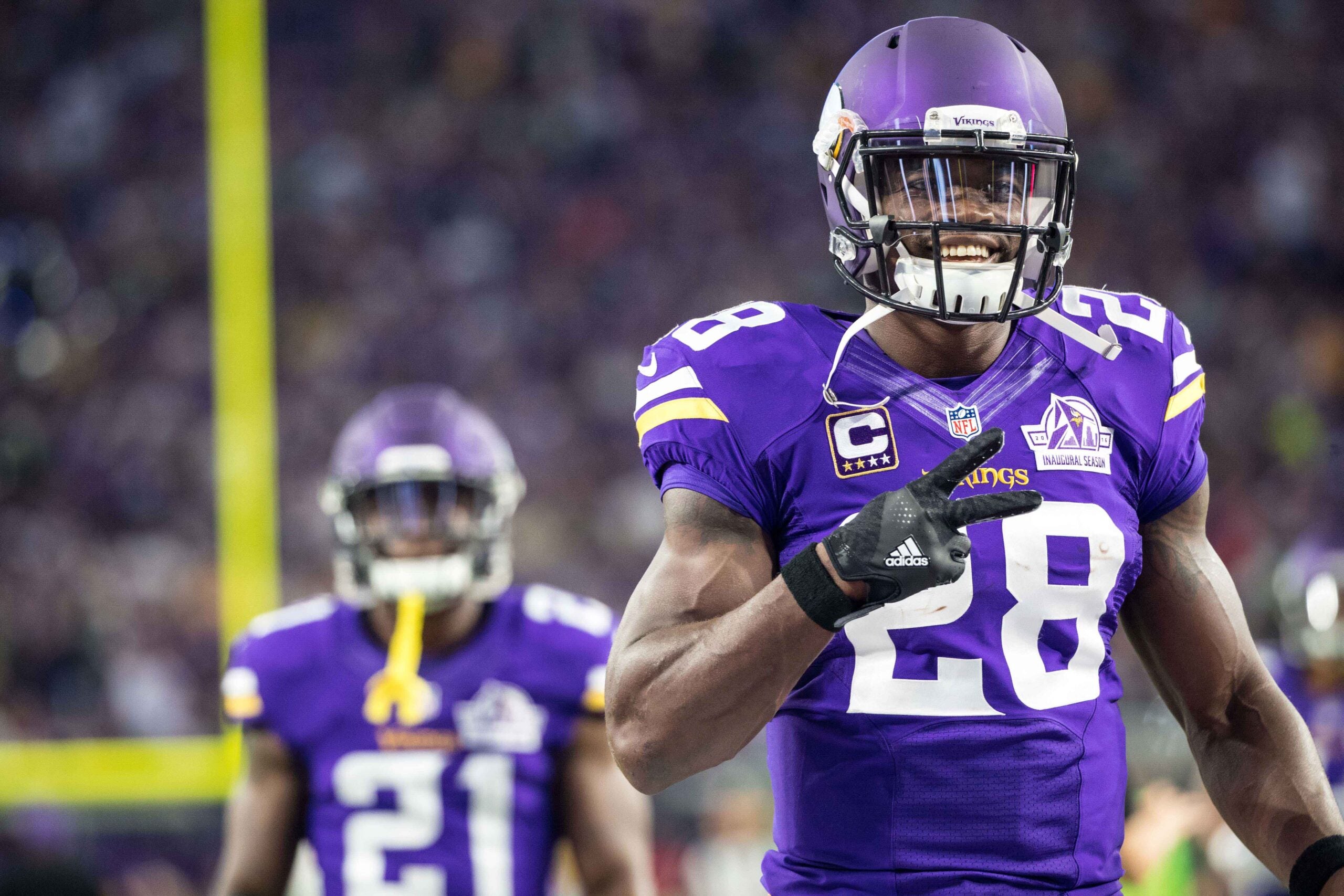 Sep 18, 2016; Minneapolis, MN, USA; Minnesota Vikings running back Adrian Peterson (28) poses for a photo against the Green Bay Packers at U.S. Bank Stadium. The Vikings defeated the Packers 17-14.