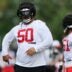 Tampa Bay Buccaneers defensive tackle Vita Vea (50) walks on the field during a combined NFL football training camp session between the Tampa Bay Buccaneers and Jacksonville Jaguars Thursday, Aug. 15, 2024 at EverBank Stadium’s Miller Electric Center in Jacksonville, Fla.