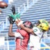 Hughes defensive back Michael Morton (4) intercepts a pass intended for Taft receiver Lorenzo McMullen (0) during the Senators' win over Hughes Saturday, Oct. 5, 2024.