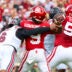 Oct 19, 2024; Norman, Oklahoma, USA; South Carolina Gamecocks edge Dylan Stewart (6) hits Oklahoma Sooners quarterback Michael Hawkins Jr. (9) and causes an interception during the first half at Gaylord Family-Oklahoma Memorial Stadium.