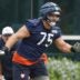 Jun 3, 2025; Lake Forest, IL, USA; Chicago Bears offensive tackle Ozzy Trapilo (75) runs on the field during minicamp at Halas Hall.