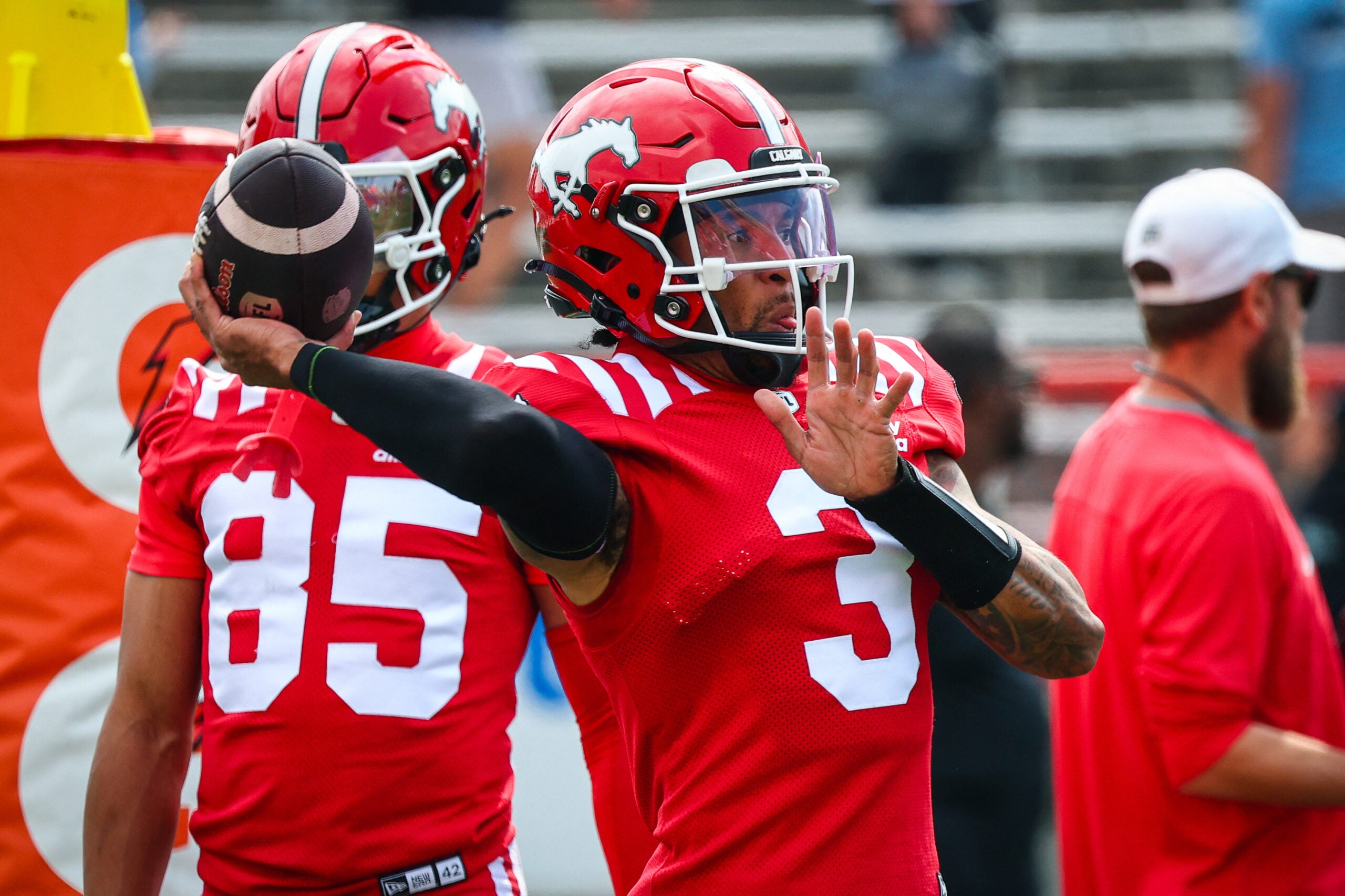Jun 7, 2025; Calgary, Alberta, Canada; Calgary Stampeders quarterback Vernon Adams Jr (3) throws the ball during warmup against the Hamilton Tiger-Cats at McMahon Stadium.
