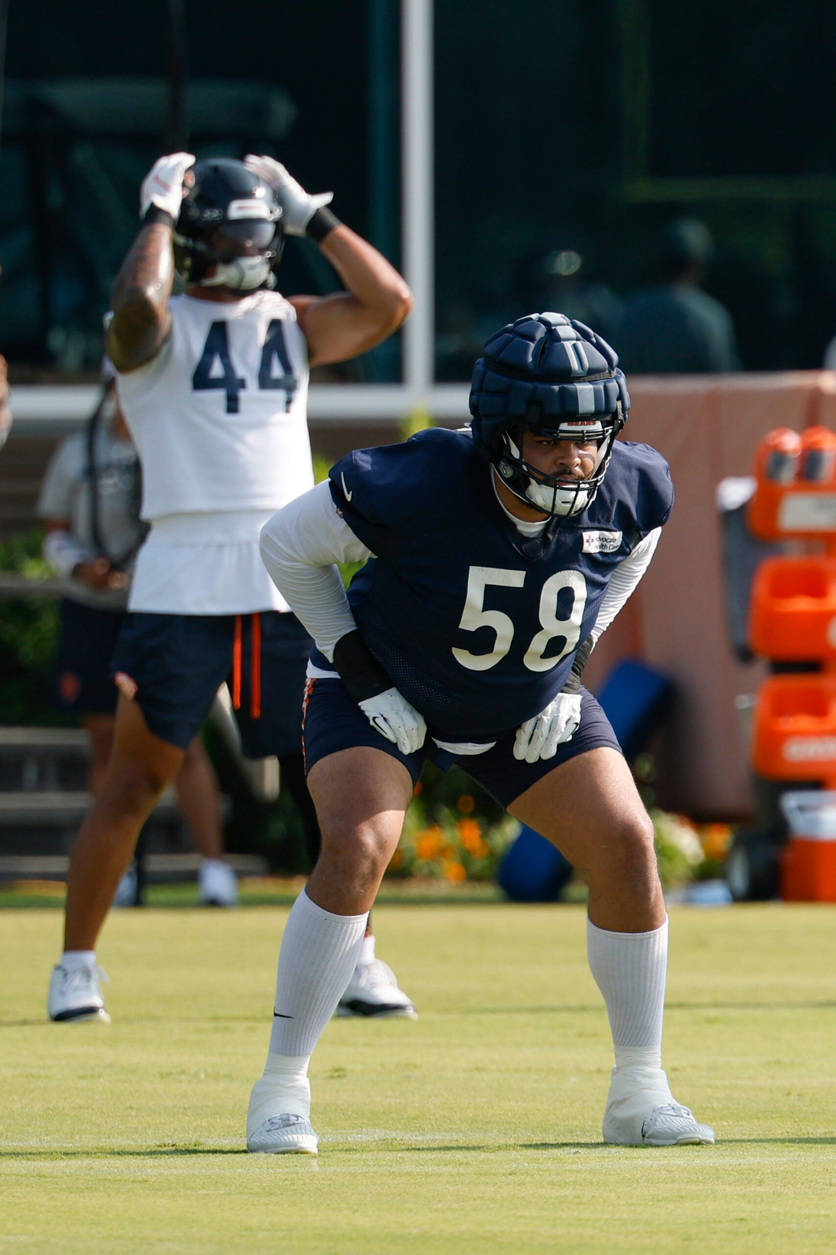 Jul 23, 2025; Lake Forest, IL, USA; Chicago Bears offensive tackle Darnell Wright (58) stretches during training camp at Halas Hall.
