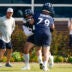 Jul 23, 2025; Lake Forest, IL, USA; Chicago Bears guard Theo Benedet (79) and offensive tackle Darnell Wright (58) run a drill during training camp at Halas Hall.