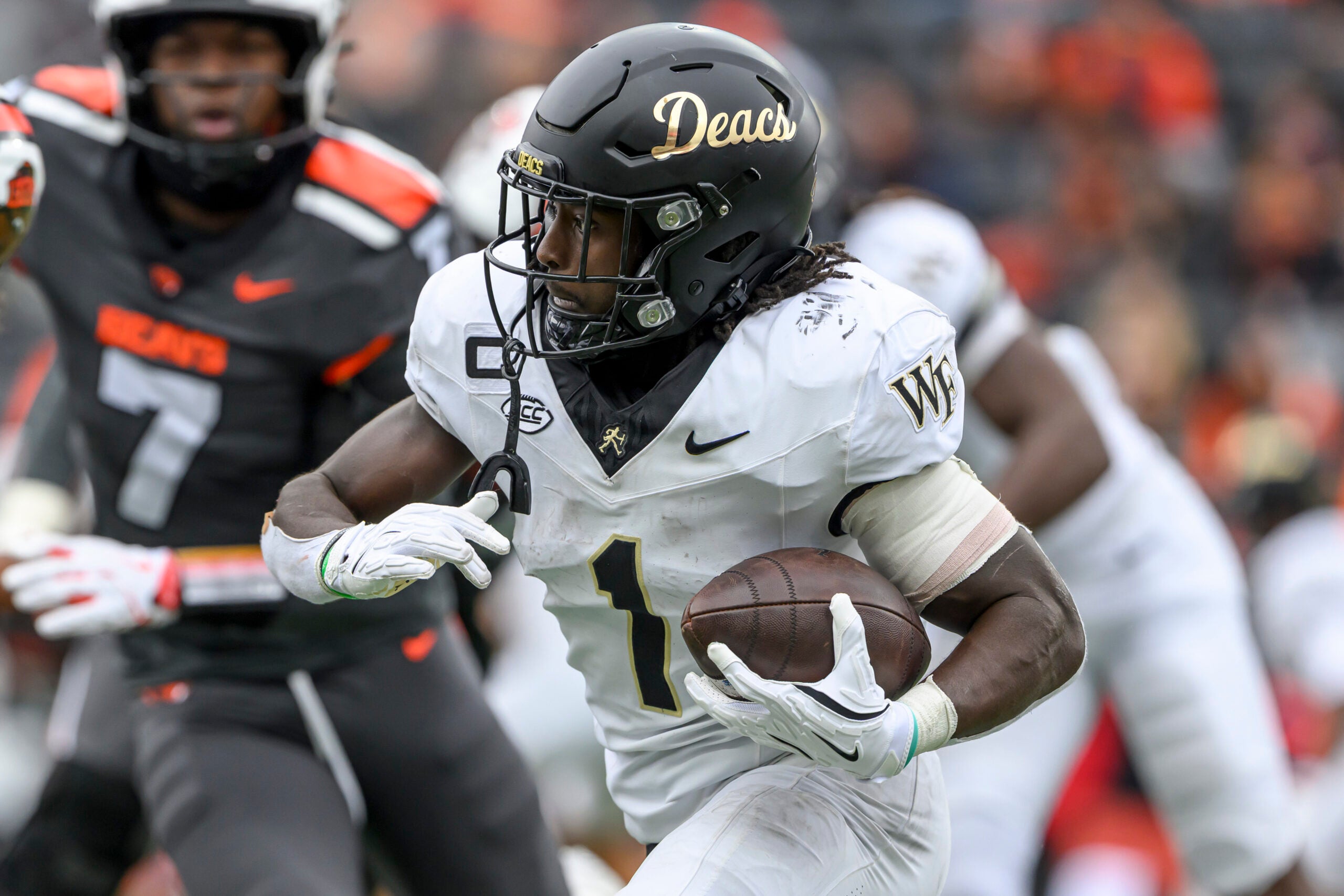 Oct 11, 2025; Corvallis, Oregon, USA; Wake Forest Demon Deacons running back Demond Claiborne (1) runs the ball during the second half against the Oregon State Beavers at Reser Stadium.