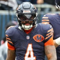 Oct 19, 2025; Chicago, Illinois, USA; Chicago Bears running back D'Andre Swift (4) reacts after rushing for a touchdown against the New Orleans Saints during the second quarter at Soldier Field.