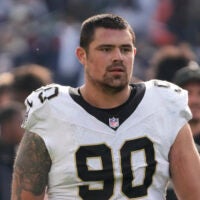 Oct 19, 2025; Chicago, Illinois, USA; New Orleans Saints defensive tackle Bryan Bresee (90) walks off the field after the game against the Chicago Bears at Soldier Field.
