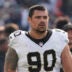 Oct 19, 2025; Chicago, Illinois, USA; New Orleans Saints defensive tackle Bryan Bresee (90) walks off the field after the game against the Chicago Bears at Soldier Field.