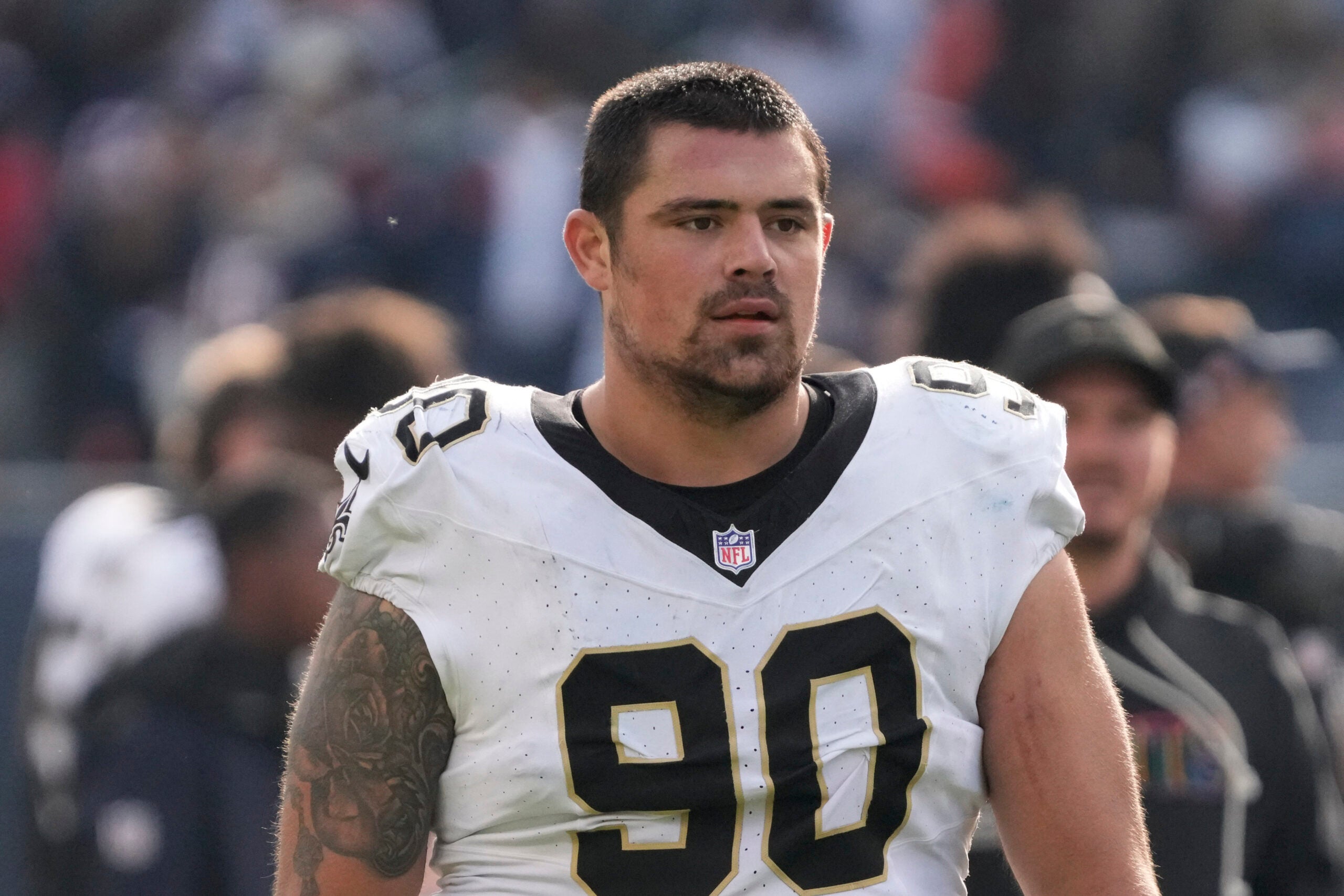 Oct 19, 2025; Chicago, Illinois, USA; New Orleans Saints defensive tackle Bryan Bresee (90) walks off the field after the game against the Chicago Bears at Soldier Field.