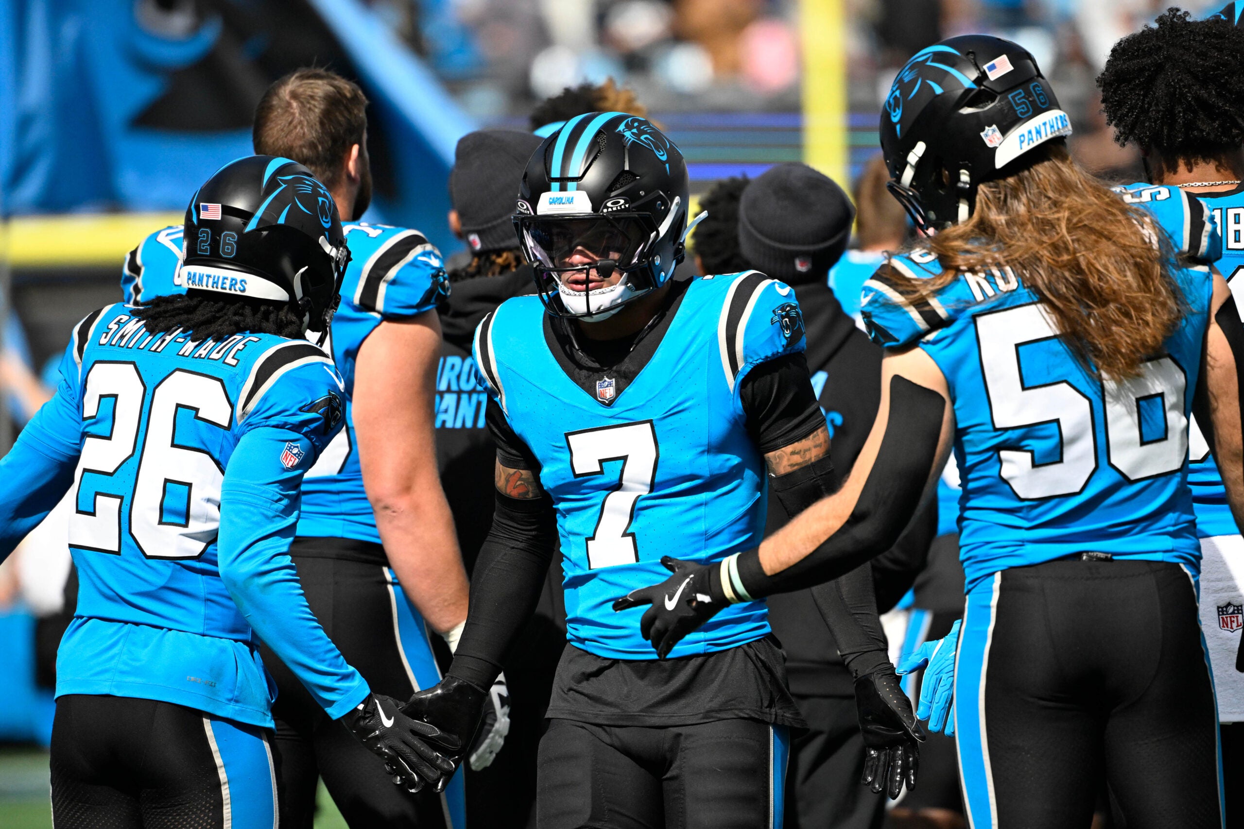 Oct 26, 2025; Charlotte, North Carolina, USA; Carolina Panthers safety Tre'von Moehrig (7) runs on to the field before the game at Bank of America Stadium.