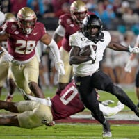 Nov 1, 2025; Tallahassee, Florida, USA; Wake Forest Demon Deacons running back Demond Claiborne (1) runs the ball during the first quarter against the Florida State Seminoles at Doak S. Campbell Stadium.