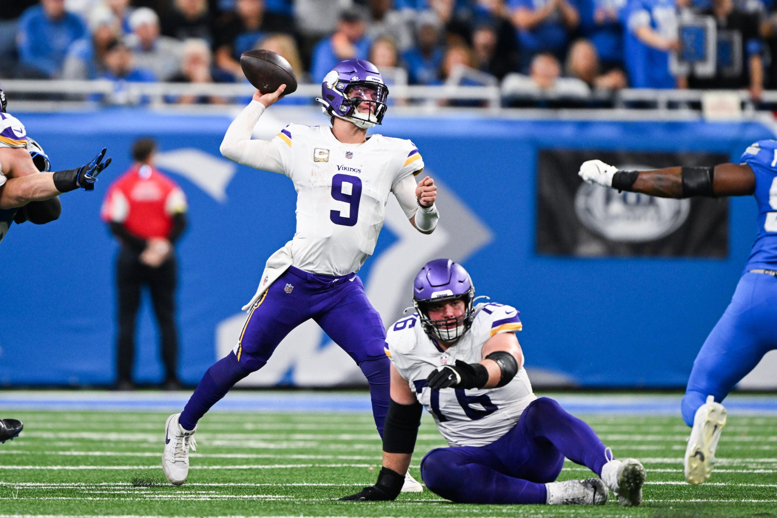 Nov 2, 2025; Detroit, Michigan, USA; Minnesota Vikings quarterback J.J. McCarthy (9) throws a pass in the second quarter against the Detroit Lions at Ford Field.