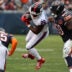 Nov 9, 2025; Chicago, Illinois, USA; New York Giants running back Devin Singletary (26) rushes the ball against Chicago Bears defensive tackle Grady Jarrett (50) during the second half at Soldier Field.