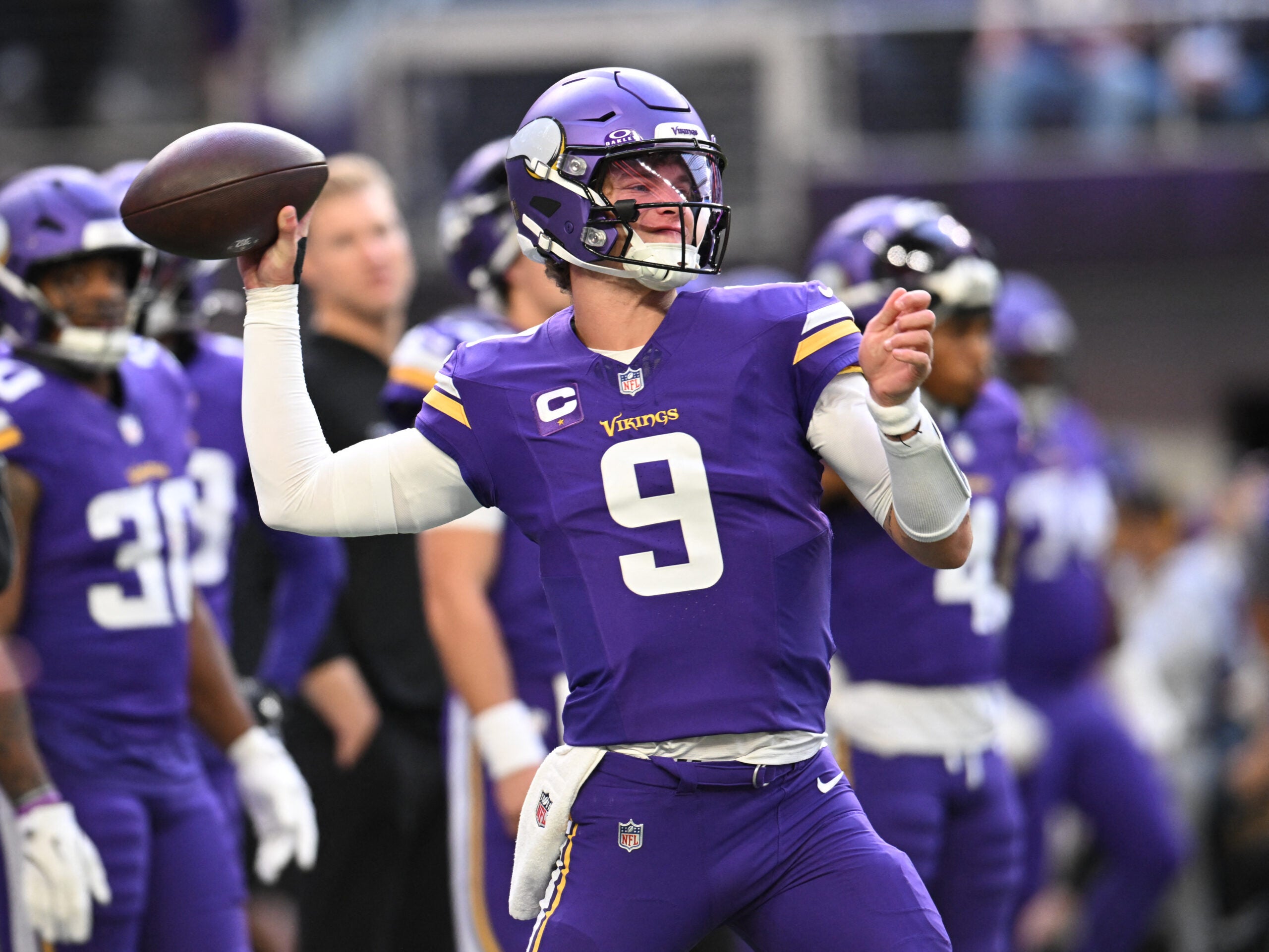 Nov 16, 2025; Minneapolis, Minnesota, USA; Minnesota Vikings quarterback J.J. McCarthy (9) warms up before a game against the Chicago Bears at U.S. Bank Stadium.