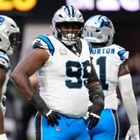 Nov 16, 2025; Atlanta, Georgia, USA; Carolina Panthers defensive tackle Derrick Brown (95) looks on in the second half against the Atlanta Falcons at Mercedes-Benz Stadium.