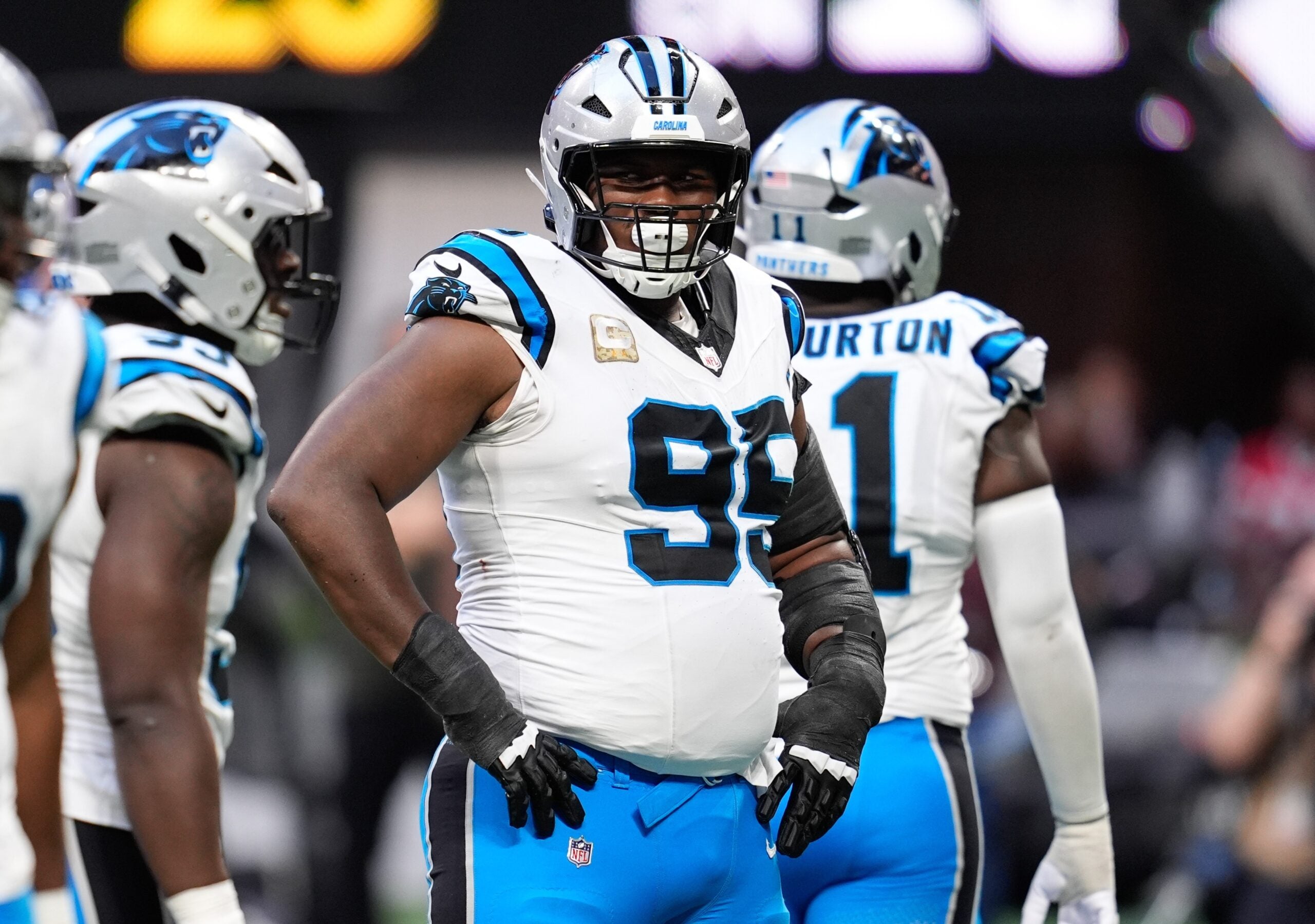 Nov 16, 2025; Atlanta, Georgia, USA; Carolina Panthers defensive tackle Derrick Brown (95) looks on in the second half against the Atlanta Falcons at Mercedes-Benz Stadium.