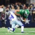Nov 23, 2025; Arlington, Texas, USA; Philadelphia Eagles tight end Dallas Goedert (88) is brought down by Dallas Cowboys cornerback Shavon Revel Jr. (34) in the third quarter at AT&T Stadium.