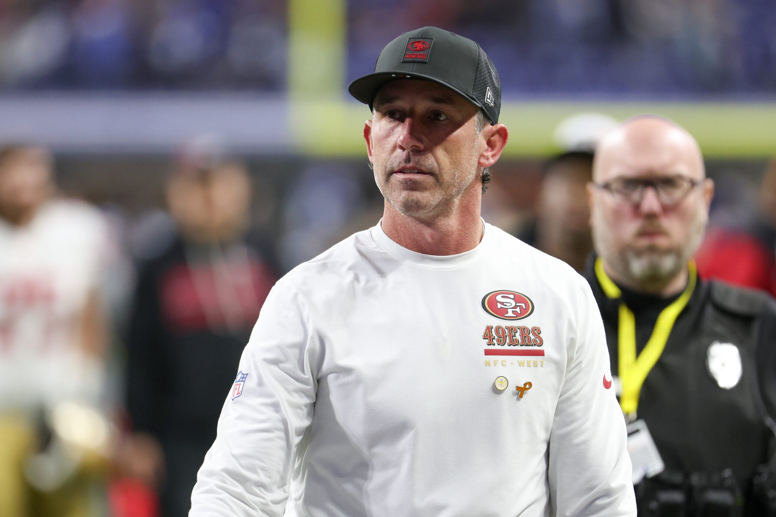 Dec 22, 2025; Indianapolis, Indiana, USA; San Francisco 49ers head coach Kyle Shanahan leaves the field after the game against the Indianapolis Colts at Lucas Oil Stadium.