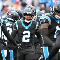 Dec 21, 2025; Charlotte, North Carolina, USA; Carolina Panthers cornerback Mike Jackson (2) runs on to the field before the game at Bank of America Stadium.