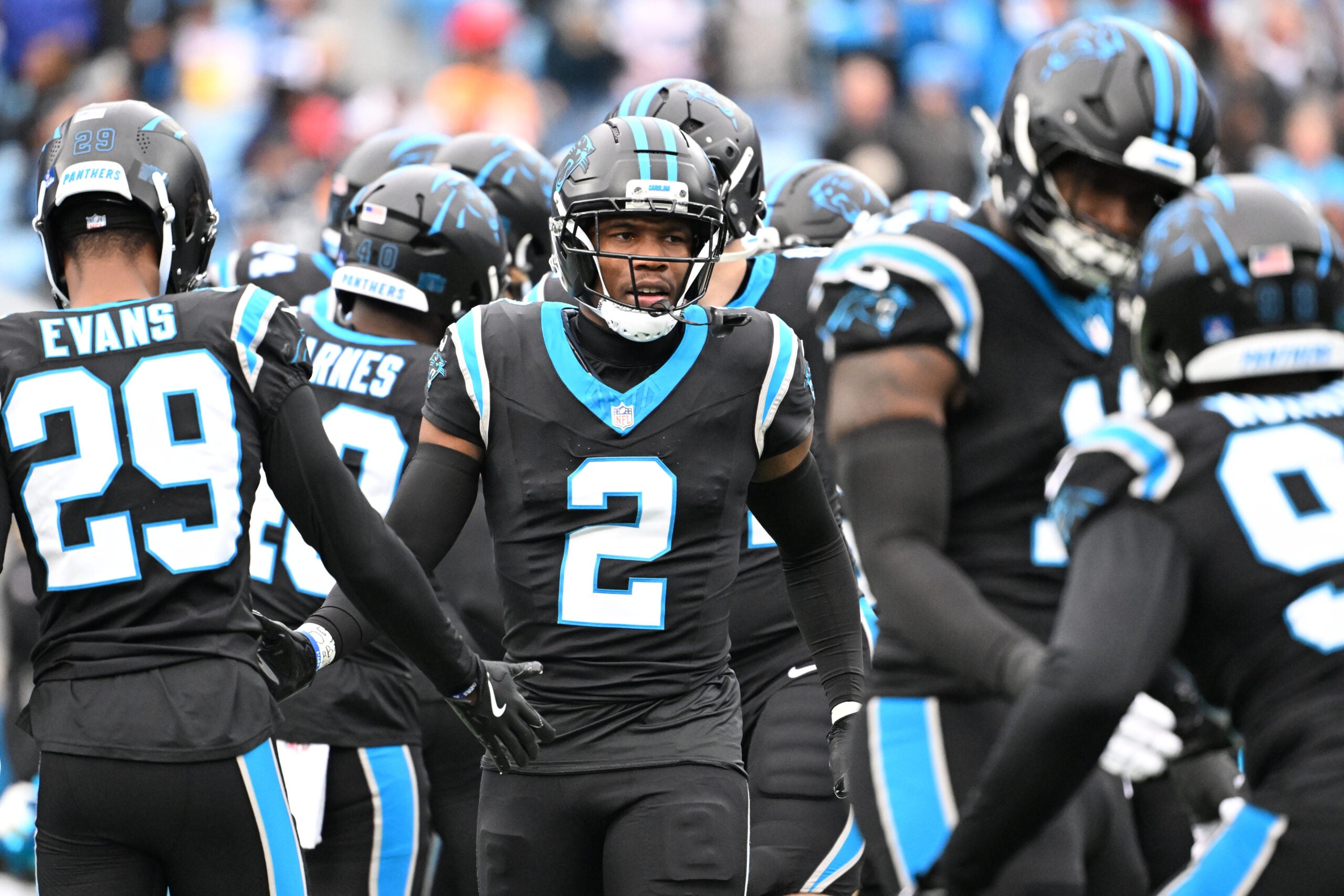 Dec 21, 2025; Charlotte, North Carolina, USA; Carolina Panthers cornerback Mike Jackson (2) runs on to the field before the game at Bank of America Stadium.