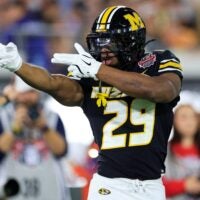 Missouri Tigers running back Ahmad Hardy (29) reacts to his first down pickup during the first quarter of the TaxSlayer Gator Bowl at EverBank Stadium, Saturday, Dec. 27, 2025, in Jacksonville. Fla.