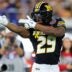Missouri Tigers running back Ahmad Hardy (29) reacts to his first down pickup during the first quarter of the TaxSlayer Gator Bowl at EverBank Stadium, Saturday, Dec. 27, 2025, in Jacksonville. Fla.