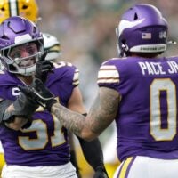 Minnesota Vikings linebacker Blake Cashman (51) celebrates with linebacker Ivan Pace Jr. (0) after sacking Green Bay Packers quarterback Clayton Tune (6) during their football game Sunday, January 4, 2026, at U.S. Bank Stadium in Minneapolis, Minnesota.