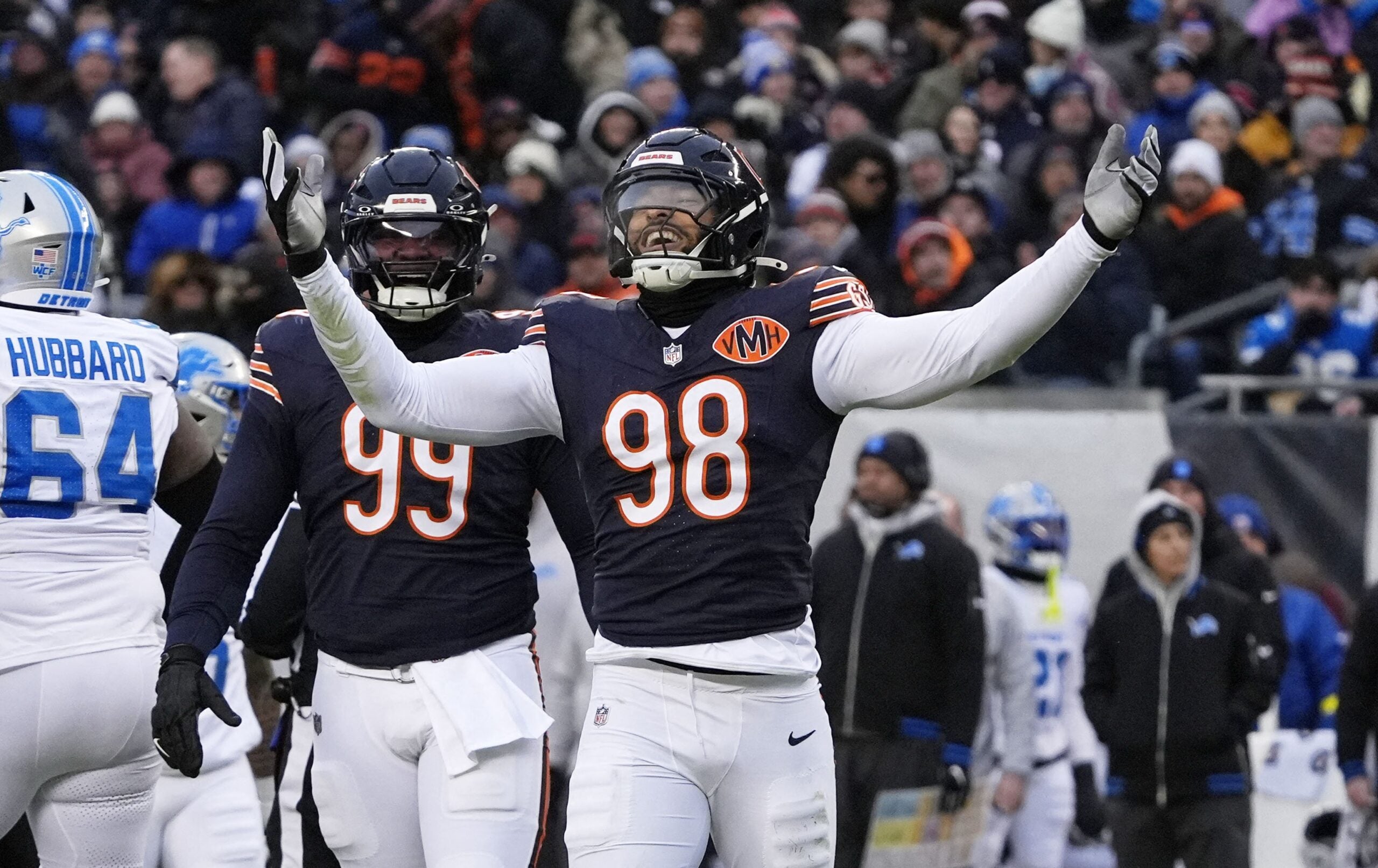 Jan 4, 2026; Chicago, Illinois, USA; Chicago Bears defensive end Montez Sweat (98) celebrates after a sack against the Detroit Lions during the first half at Soldier Field.