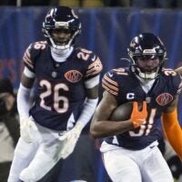 Jan 4, 2026; Chicago, Illinois, USA; Chicago Bears safety Kevin Byard III (31) runs with the ball after making an interception against the Detroit Lions during the second half at Soldier Field.