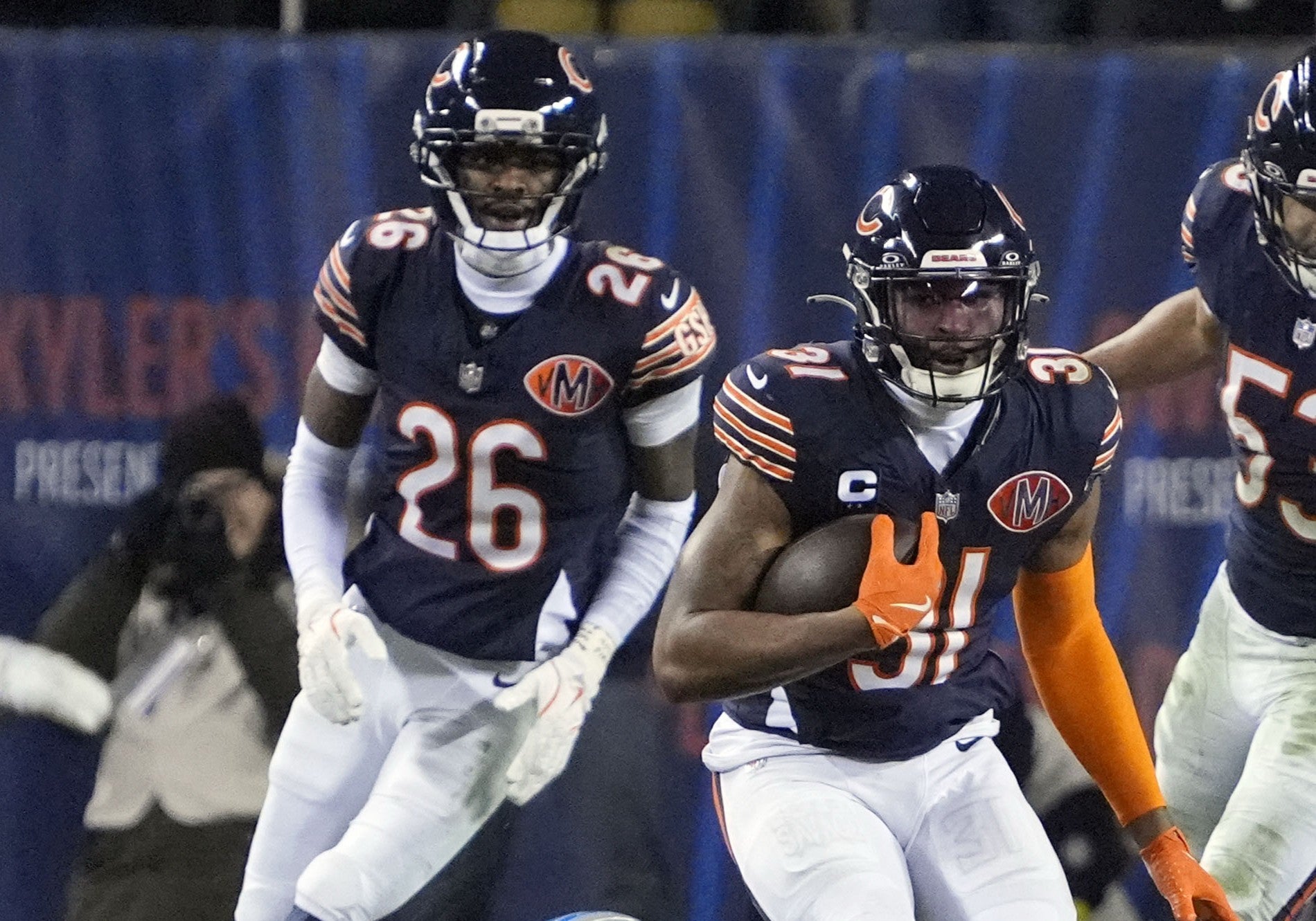 Jan 4, 2026; Chicago, Illinois, USA; Chicago Bears safety Kevin Byard III (31) runs with the ball after making an interception against the Detroit Lions during the second half at Soldier Field.