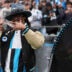 Jan 10, 2026; Charlotte, NC, USA; Former Carolina Panthers Cam Newton in the first half during the NFC Wild Card Round game at Bank of America Stadium.