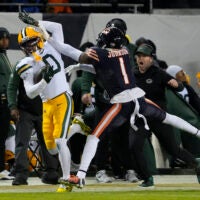 Jan 10, 2026; Chicago, IL, USA; Green Bay Packers wide receiver Matthew Golden (0) makes the reception as Chicago Bears cornerback Jaylon Johnson (1) defends during the first half of an NFC Wild Card Round game at Soldier Field.